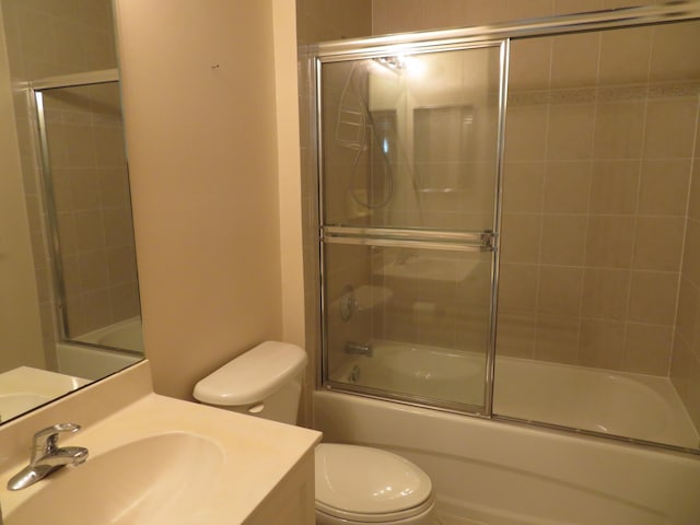 2357 Windjammer Way, West Palm Beach, FL 33411 - bathroom featuring vanity and bath / shower combo with glass door