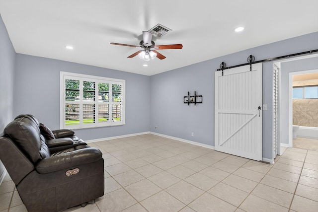 11784 Laurel Valley Cir, Wellington, FL 33414 - unfurnished living room featuring a barn door, ceiling fan, light tile patterned floors, and recessed lighting