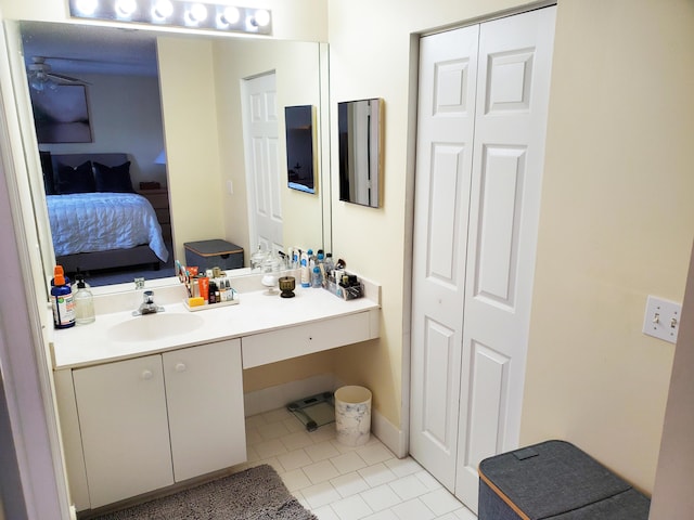 871 NW 208th Cir, Pembroke Pines, FL 33029 - ensuite bathroom with a closet, tile patterned flooring, vanity, and a ceiling fan