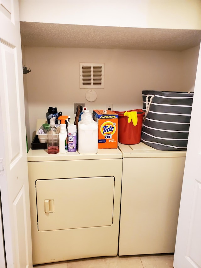 871 NW 208th Cir, Pembroke Pines, FL 33029 - laundry room with washing machine and clothes dryer and light tile patterned floors