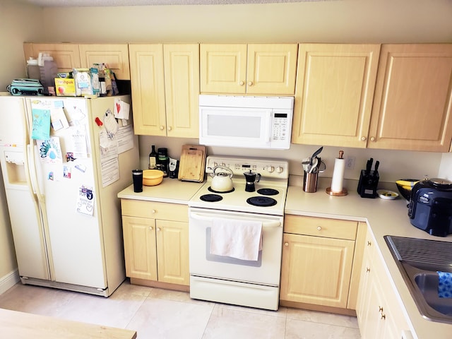 871 NW 208th Cir, Pembroke Pines, FL 33029 - kitchen with white appliances, light countertops, and light brown cabinets