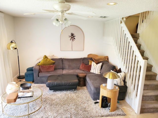 871 NW 208th Cir, Pembroke Pines, FL 33029 - living room with stairs, a ceiling fan, and a textured ceiling