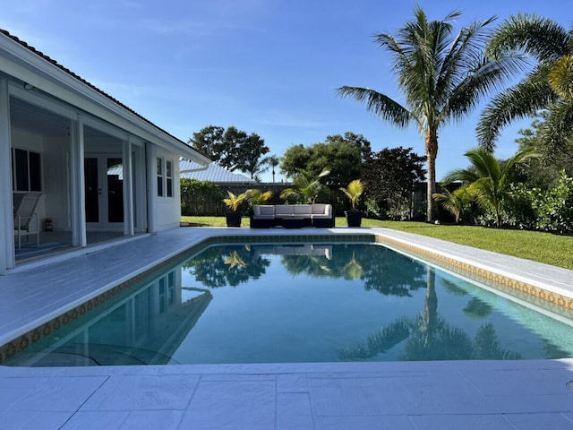 1951 SE Erwin Rd, Port Saint Lucie, FL 34952 - view of pool with french doors, an outdoor living space, and a patio