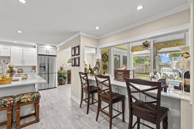 1951 SE Erwin Rd, Port Saint Lucie, FL 34952 - dining room with ornamental molding and recessed lighting