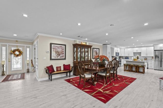 1951 SE Erwin Rd, Port Saint Lucie, FL 34952 - dining space with ornamental molding, recessed lighting, and light wood-style flooring