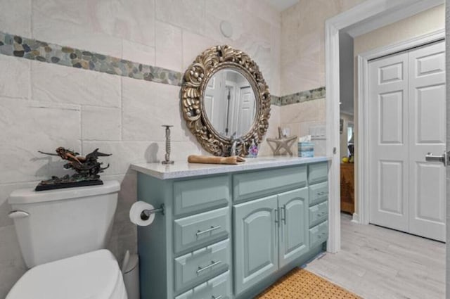 1951 SE Erwin Rd, Port Saint Lucie, FL 34952 - bathroom with tile walls and vanity