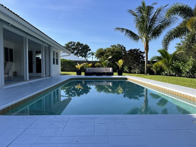 1951 SE Erwin Rd, Port Saint Lucie, FL 34952 - view of pool with french doors, a patio area, and an outdoor living space
