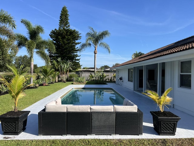1951 SE Erwin Rd, Port Saint Lucie, FL 34952 - view of swimming pool featuring outdoor lounge area, a fenced backyard, and a patio area