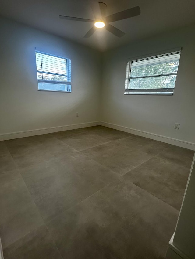 790 Sarazen Dr, West Palm Beach, FL 33413 - spare room featuring healthy amount of natural light and a ceiling fan