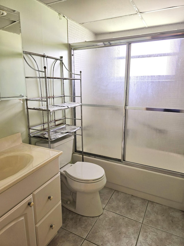 89 Saxony B B, Delray Beach, FL 33446 - bathroom with vanity, combined bath / shower with glass door, and tile patterned floors