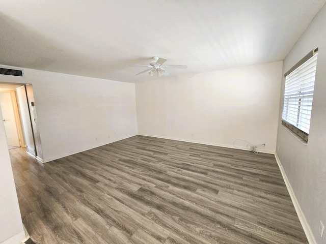 89 Saxony B B, Delray Beach, FL 33446 - empty room with a ceiling fan and wood finished floors