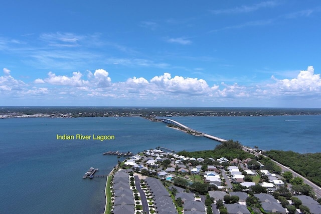3492 NE Causeway Blvd Unit 104, Jensen Beach, FL 34957 - aerial view of residential area with a nearby body of water
