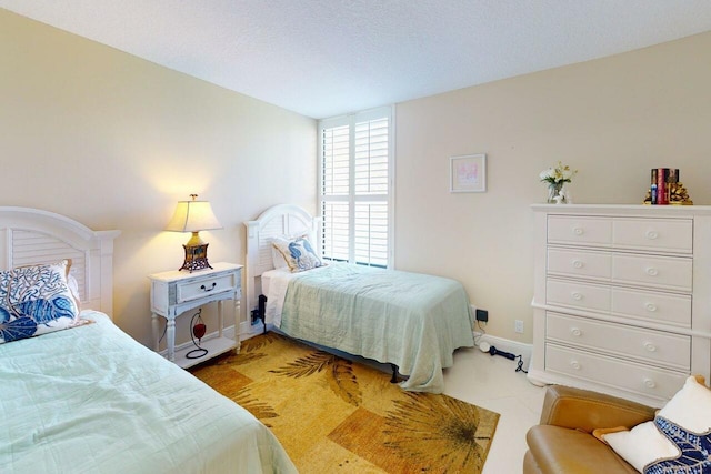 3492 NE Causeway Blvd Unit 104, Jensen Beach, FL 34957 - bedroom with baseboards