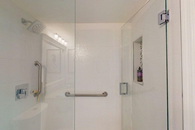 3492 NE Causeway Blvd Unit 104, Jensen Beach, FL 34957 - bathroom featuring a shower stall