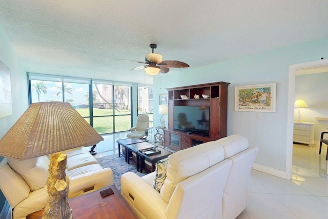 3492 NE Causeway Blvd Unit 104, Jensen Beach, FL 34957 - living room with a ceiling fan and healthy amount of natural light