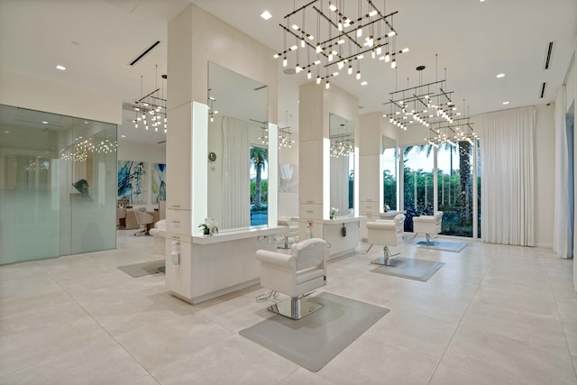 102 Victory Dr, Jupiter, FL 33477 - community lobby with a towering ceiling and recessed lighting