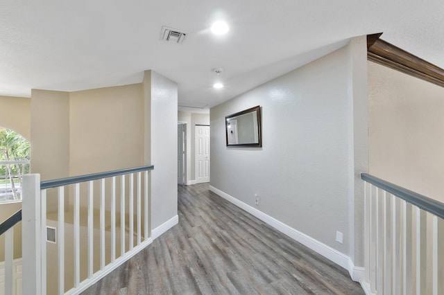 12358 Saint Simon Dr, Boca Raton, FL 33428 - hallway with an upstairs landing, wood finished floors, and recessed lighting