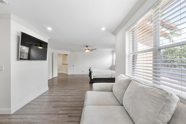 12358 Saint Simon Dr, Boca Raton, FL 33428 - living room featuring wood finished floors, a ceiling fan, ornamental molding, and recessed lighting