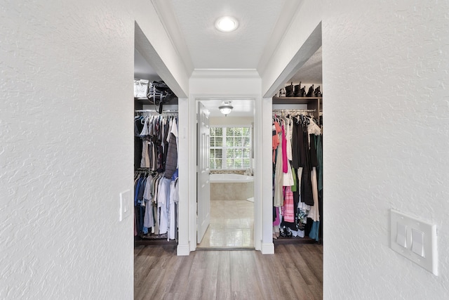 12358 Saint Simon Dr, Boca Raton, FL 33428 - spacious closet featuring wood finished floors