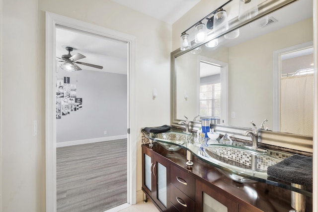 12358 Saint Simon Dr, Boca Raton, FL 33428 - bathroom featuring double vanity, a ceiling fan, and wood finished floors