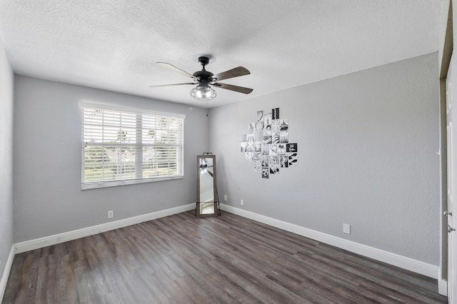 12358 Saint Simon Dr, Boca Raton, FL 33428 - unfurnished room featuring dark wood-style flooring, ceiling fan, and a textured ceiling