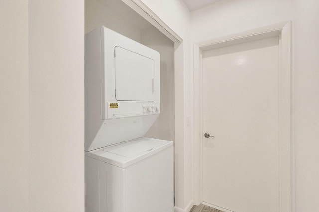 3824 SE Fairway E, Stuart, FL 34997 - laundry room with stacked washer and clothes dryer