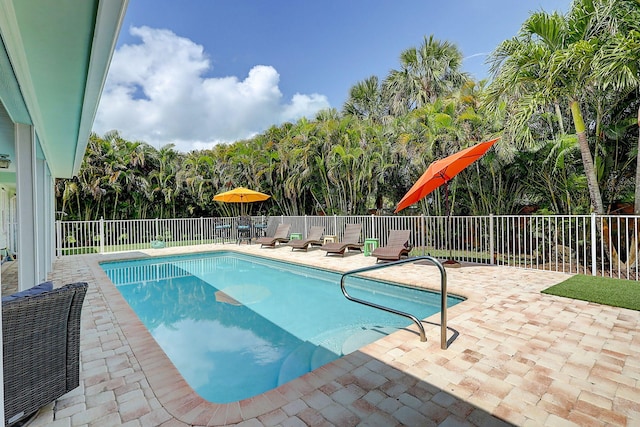 3824 SE Fairway E, Stuart, FL 34997 - view of swimming pool with a patio