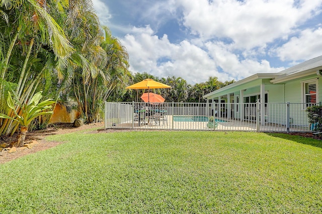 3824 SE Fairway E, Stuart, FL 34997 - view of yard featuring a patio