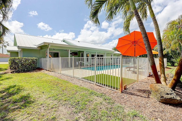 3824 SE Fairway E, Stuart, FL 34997 - view of swimming pool featuring ceiling fan and a patio area