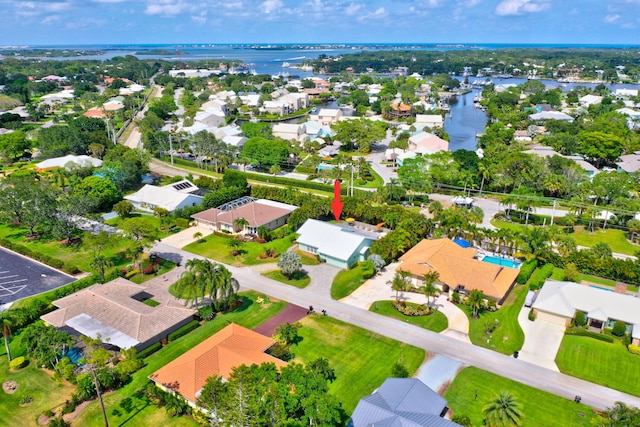 3824 SE Fairway E, Stuart, FL 34997 - aerial perspective of suburban area featuring a large body of water