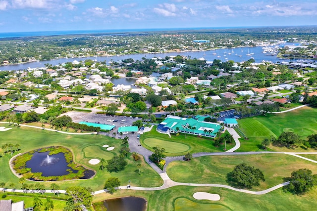 3824 SE Fairway E, Stuart, FL 34997 - aerial view of property and surrounding area featuring a nearby body of water and nearby suburban area