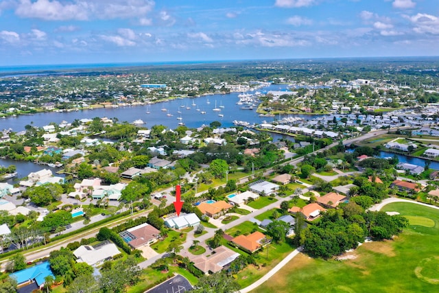 3824 SE Fairway E, Stuart, FL 34997 - aerial overview of property's location featuring nearby suburban area and a nearby body of water