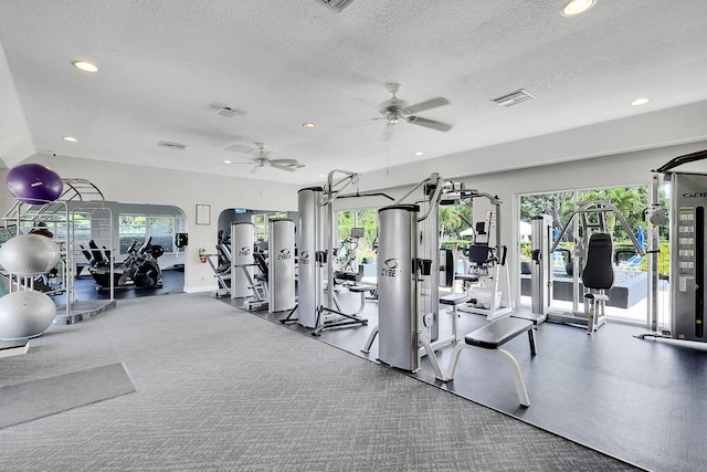 3824 SE Fairway E, Stuart, FL 34997 - workout area with a textured ceiling, ceiling fan, and recessed lighting