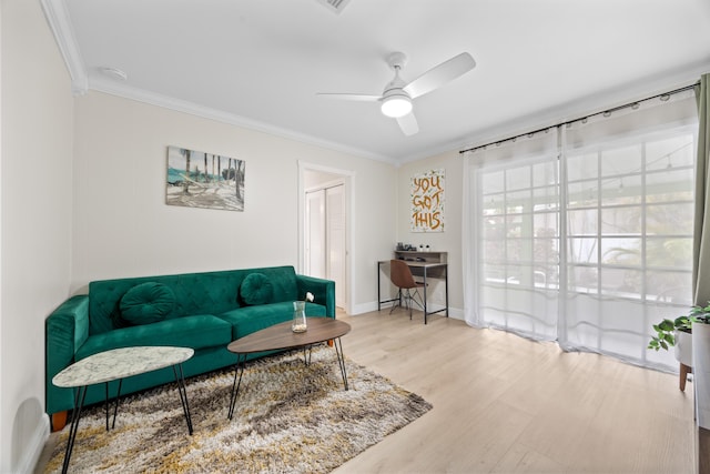 815 Green St, West Palm Beach, FL 33405 - living area featuring crown molding, ceiling fan, and wood finished floors