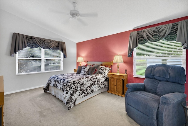 6679 Sherbrook Dr, Boynton Beach, FL 33437 - carpeted bedroom featuring vaulted ceiling, multiple windows, and a ceiling fan