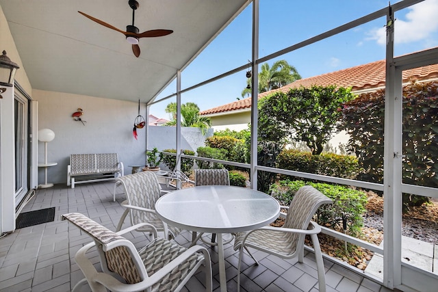 6679 Sherbrook Dr, Boynton Beach, FL 33437 - sunroom featuring lofted ceiling, ceiling fan, and outdoor dining area