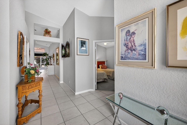 6679 Sherbrook Dr, Boynton Beach, FL 33437 - corridor featuring light tile patterned floors and lofted ceiling