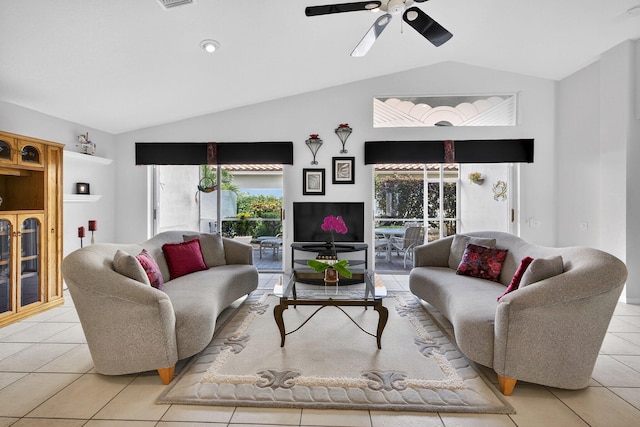 6679 Sherbrook Dr, Boynton Beach, FL 33437 - living room with vaulted ceiling, light tile patterned floors, and a ceiling fan