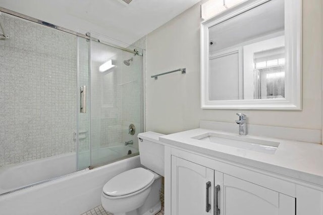 5480 N Ocean Dr Unit B1A, Singer Island, FL 33404 - full bathroom featuring vanity and combined bath / shower with glass door