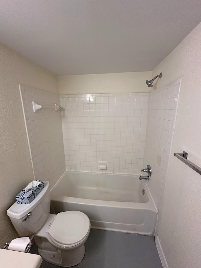 1401 Village Blvd Unit 1914, West Palm Beach, FL 33409 - bathroom featuring  shower combination and a textured wall