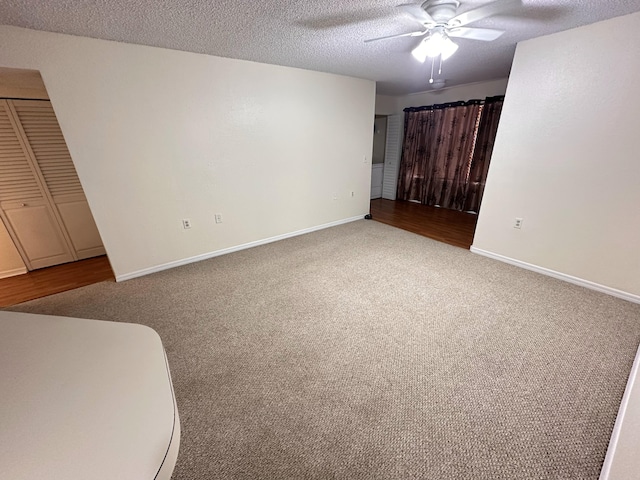 1401 Village Blvd Unit 1914, West Palm Beach, FL 33409 - unfurnished bedroom with carpet floors, a textured ceiling, and ceiling fan