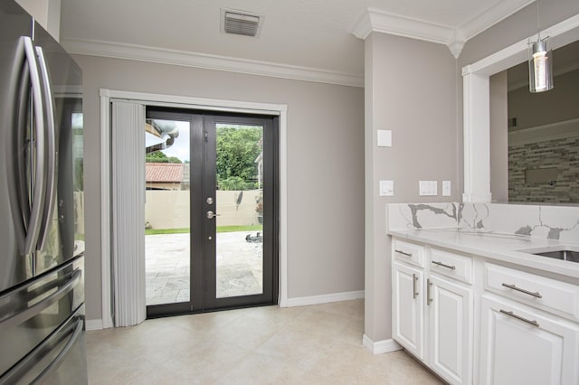 21734 San Simeon Cir, Boca Raton, FL 33433 - doorway to outside with french doors, ornamental molding, and light tile patterned flooring