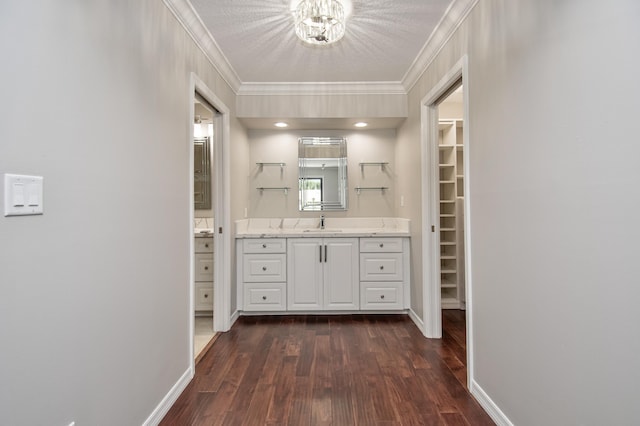 21734 San Simeon Cir, Boca Raton, FL 33433 - hallway with dark wood-type flooring and ornamental molding