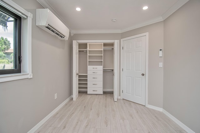 21734 San Simeon Cir, Boca Raton, FL 33433 - unfurnished bedroom with a wall unit AC, light wood-type flooring, recessed lighting, crown molding, and a closet