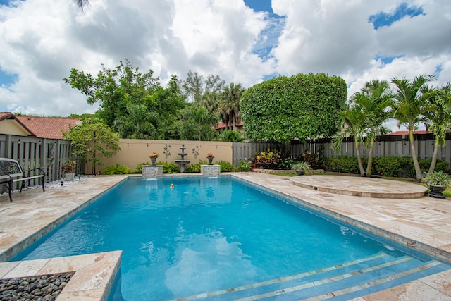 21734 San Simeon Cir, Boca Raton, FL 33433 - view of pool featuring a patio area and a fenced backyard