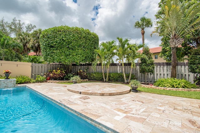 21734 San Simeon Cir, Boca Raton, FL 33433 - view of swimming pool featuring a patio and a fenced backyard