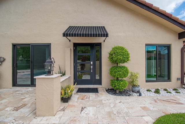 21734 San Simeon Cir, Boca Raton, FL 33433 - property entrance featuring stucco siding