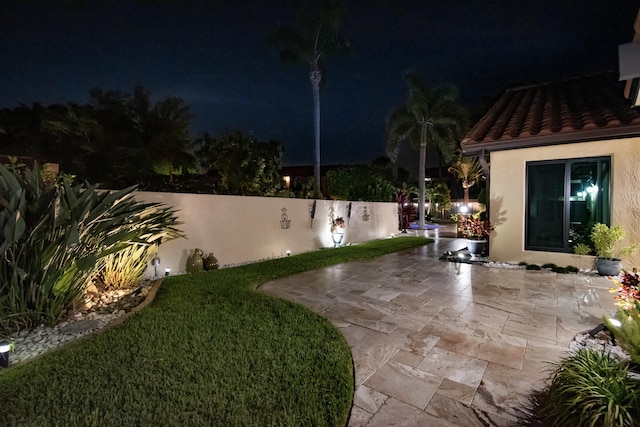 21734 San Simeon Cir, Boca Raton, FL 33433 - yard at twilight featuring a patio area