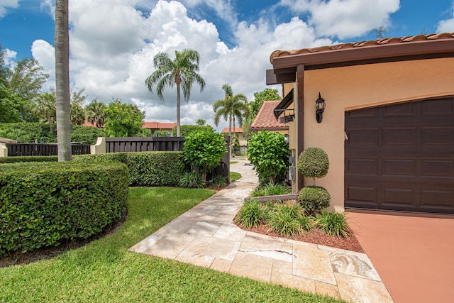 21734 San Simeon Cir, Boca Raton, FL 33433 - view of yard featuring a garage