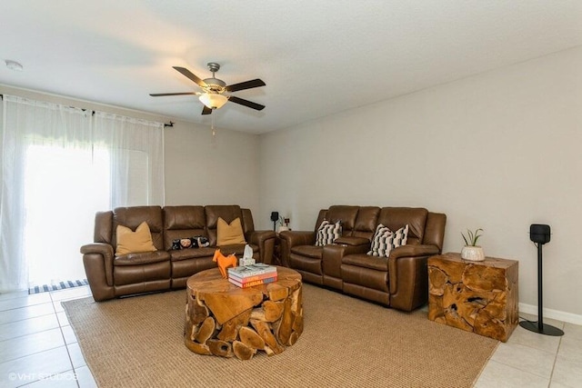5126 Dandelion St, Apollo Beach, FL 33572 - living room with light tile patterned floors and a ceiling fan